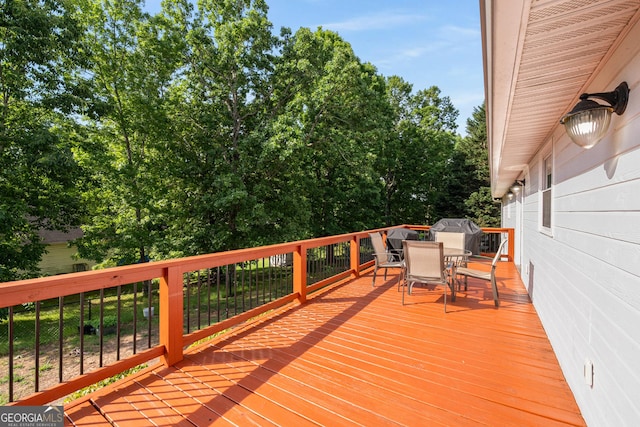 deck featuring outdoor dining space