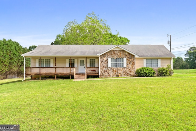 873 Austin Rd, Newnan, GA 30263 - single story home featuring covered porch, a front lawn, and stone siding
