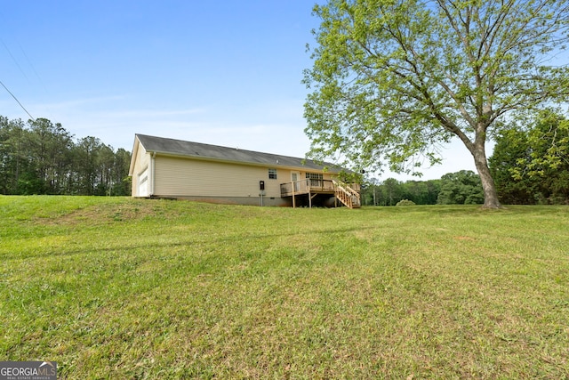873 Austin Rd, Newnan, GA 30263 - view of grassy yard with a wooden deck and stairs