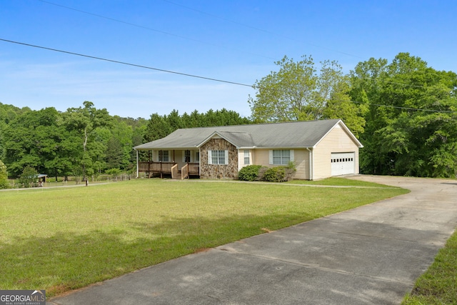 873 Austin Rd, Newnan, GA 30263 - single story home with concrete driveway, a front yard, and a garage