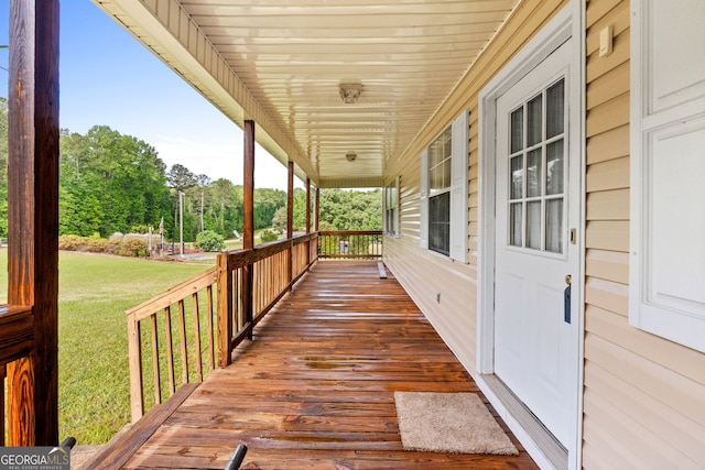 873 Austin Rd, Newnan, GA 30263 - wooden terrace with a porch and a lawn
