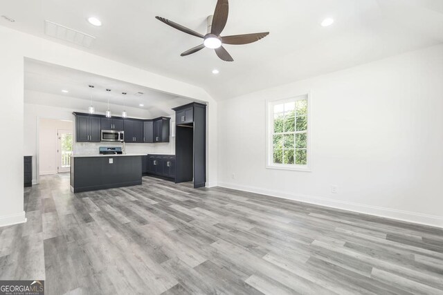 2349 Berthadale Ave, Macon, GA 31204 - unfurnished living room with a ceiling fan, recessed lighting, and plenty of natural light