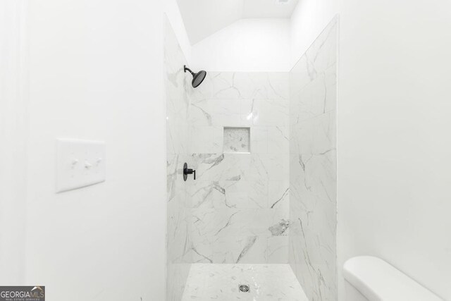 2349 Berthadale Ave, Macon, GA 31204 - full bathroom with vaulted ceiling, toilet, and a shower stall