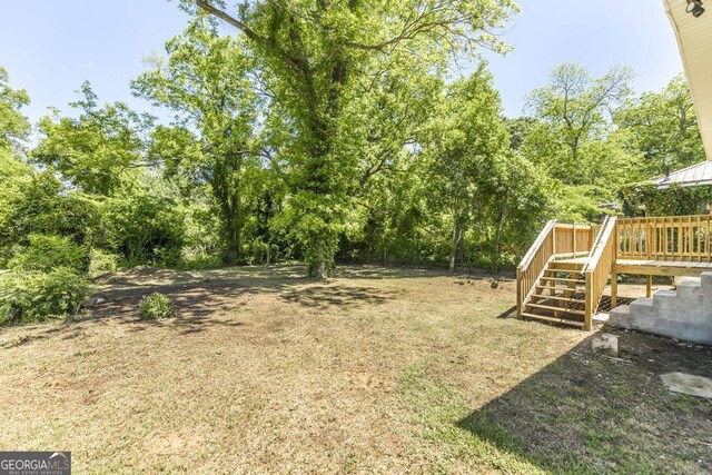 2349 Berthadale Ave, Macon, GA 31204 - view of yard featuring a deck and stairs
