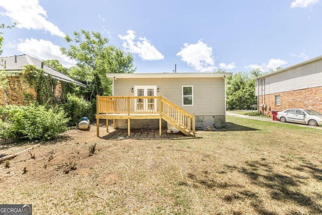 2349 Berthadale Ave, Macon, GA 31204 - back of property with a lawn, a deck, french doors, and stairs
