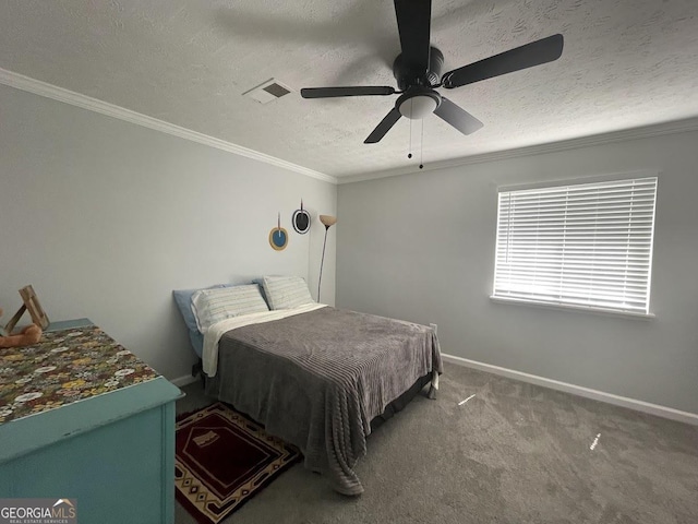 bedroom featuring ornamental molding, a textured ceiling, carpet, visible vents, and baseboards