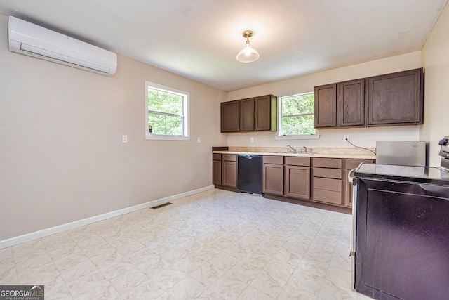 kitchen with light countertops, a wall mounted air conditioner, electric range oven, baseboards, and dishwasher