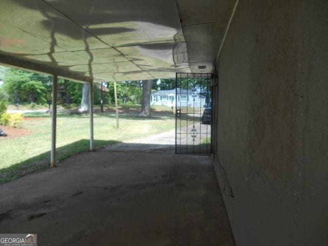 view of patio featuring a gate