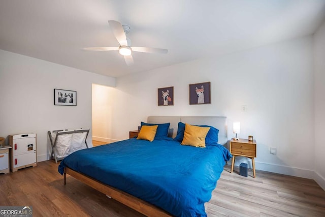 82 Dearborn St SE, Atlanta, GA 30317 - bedroom featuring wood finished floors, baseboards, and ceiling fan