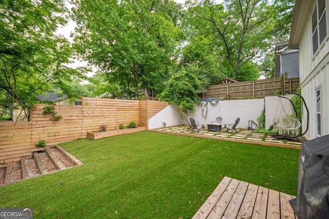 82 Dearborn St SE, Atlanta, GA 30317 - view of yard with a deck