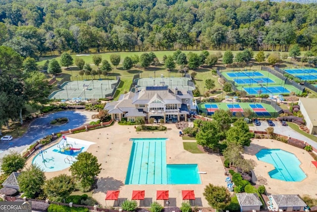 drone / aerial view of a pool