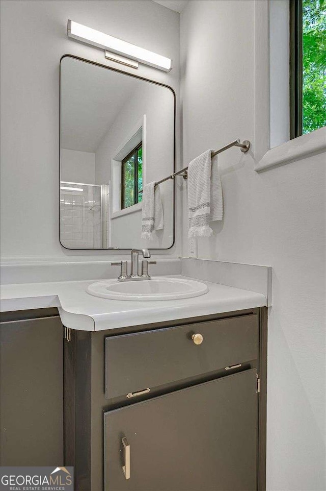 bathroom featuring vanity and plenty of natural light