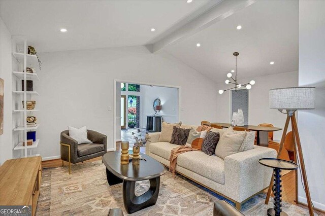 living room featuring a chandelier, wood finished floors, recessed lighting, and baseboards