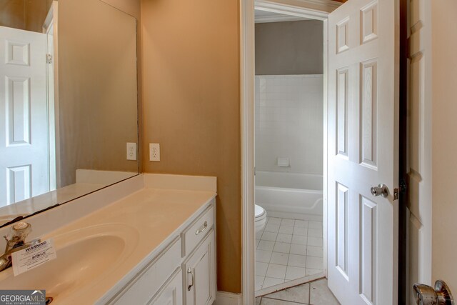135 Magnolia Dr, Oxford, GA 30054 - full bath with toilet, tile patterned flooring, vanity, and a bathtub