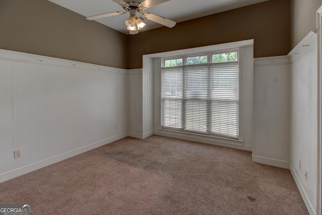 135 Magnolia Dr, Oxford, GA 30054 - spare room with light colored carpet, baseboards, and ceiling fan