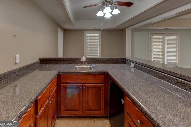 135 Magnolia Dr, Oxford, GA 30054 - kitchen with a ceiling fan, dark countertops, a sink, and dishwasher