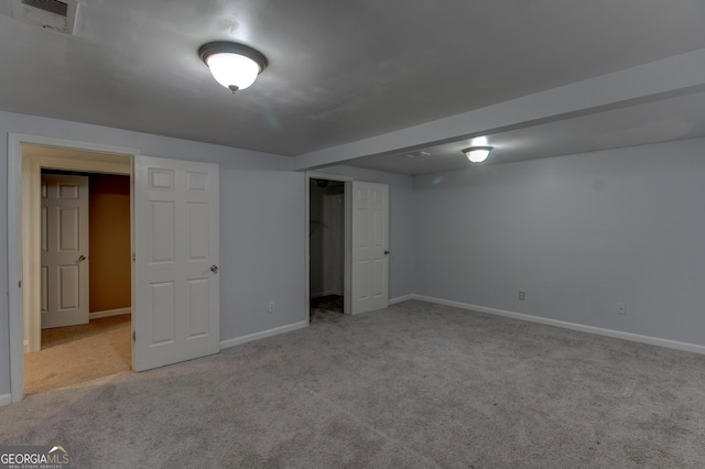 135 Magnolia Dr, Oxford, GA 30054 - finished below grade area with carpet flooring, baseboards, and visible vents