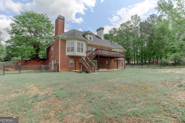 135 Magnolia Dr, Oxford, GA 30054 - back of property featuring stairway, a deck, a fenced backyard, and a chimney