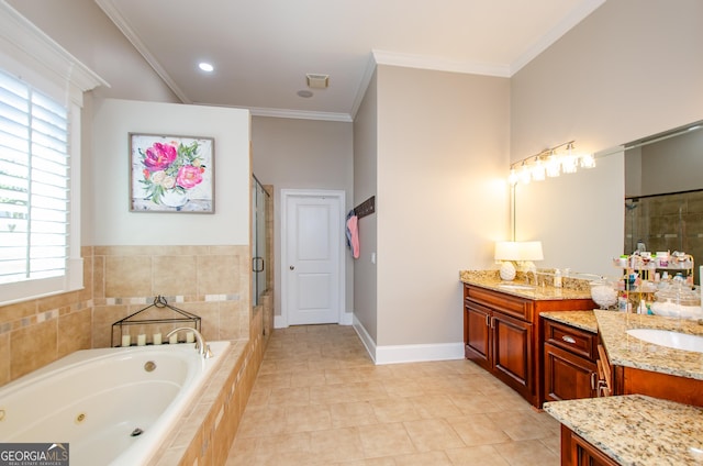 1340 Traditions Way, Jefferson, GA 30549 - bathroom featuring vanity, a stall shower, a jetted tub, plenty of natural light, and ornamental molding