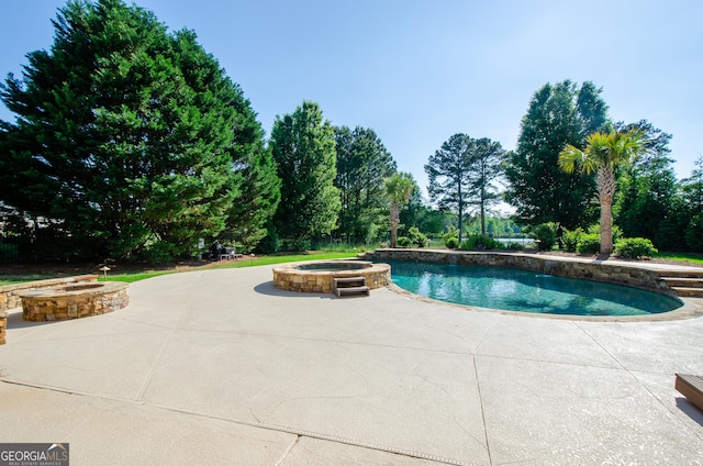 1340 Traditions Way, Jefferson, GA 30549 - view of swimming pool with a patio and a pool with connected hot tub