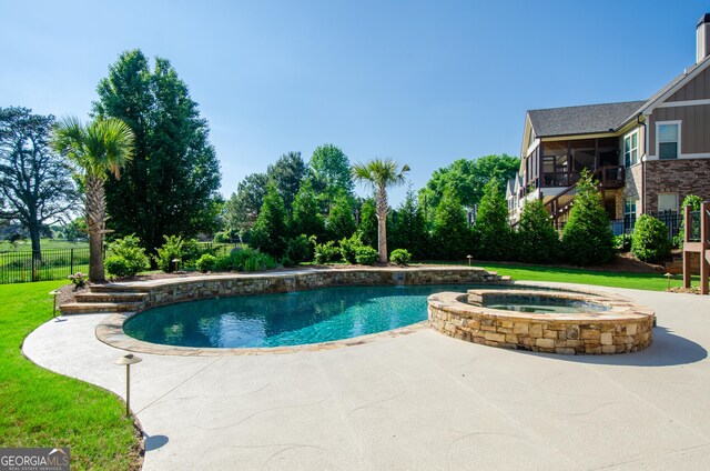 1340 Traditions Way, Jefferson, GA 30549 - view of pool featuring a pool with connected hot tub and a patio area