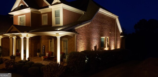 1340 Traditions Way, Jefferson, GA 30549 - view of front of home with covered porch and brick siding