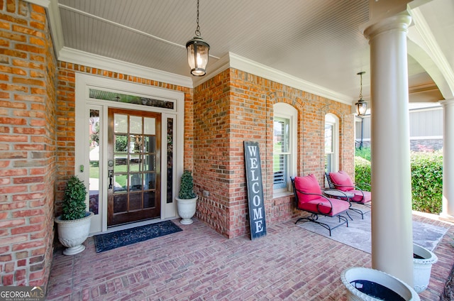 1340 Traditions Way, Jefferson, GA 30549 - doorway to property featuring a porch and brick siding