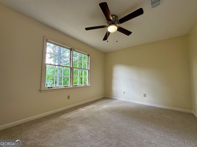 5307 Red Rock Trce, Powder Springs, GA 30127 - carpeted spare room featuring baseboards and a ceiling fan