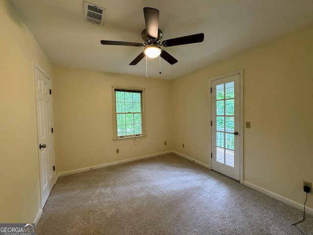 5307 Red Rock Trce, Powder Springs, GA 30127 - carpeted empty room with plenty of natural light, baseboards, and a ceiling fan