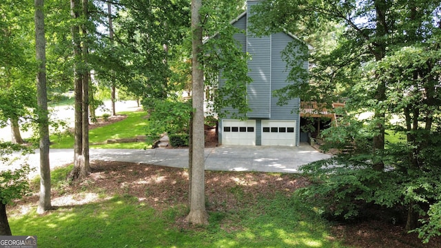 5307 Red Rock Trce, Powder Springs, GA 30127 - view of side of property featuring a garage and concrete driveway