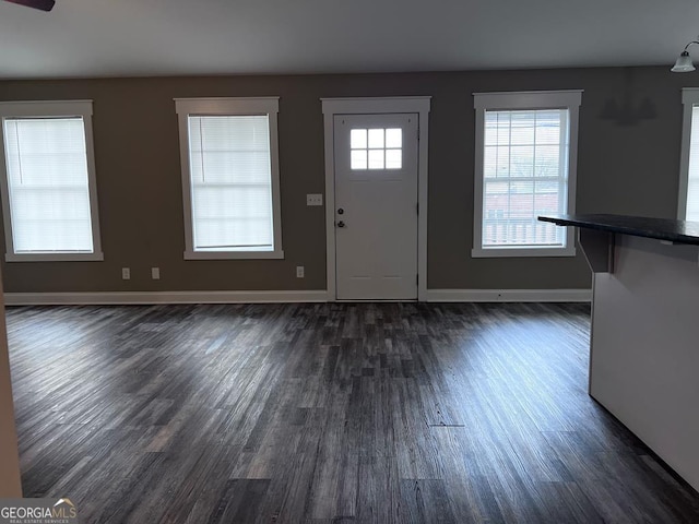 201 Jones St, Dalton, GA 30720 - entrance foyer with baseboards and dark wood finished floors