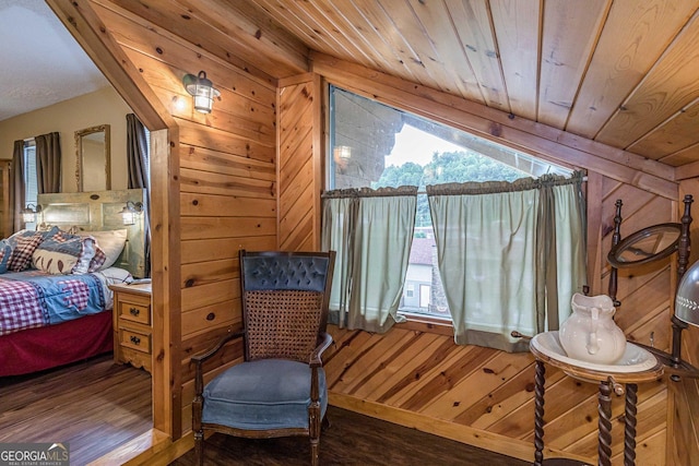 bedroom featuring wooden ceiling, wood walls, and wood finished floors