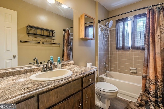 full bath with vanity, toilet, shower / bath combination with curtain, and wood finished floors