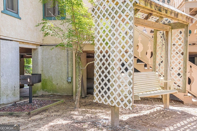 exterior space featuring stucco siding