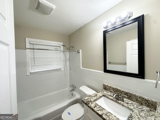 1814 Mary Lou Ln SE, Atlanta, GA 30316 - bathroom with toilet, bathtub / shower combination, tile walls, visible vents, and vanity