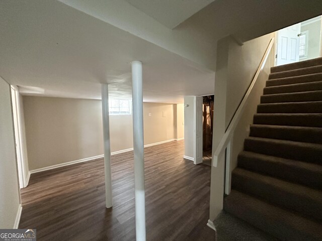 1814 Mary Lou Ln SE, Atlanta, GA 30316 - finished below grade area featuring stairway, baseboards, and dark wood finished floors