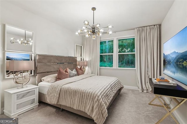carpeted bedroom featuring a chandelier