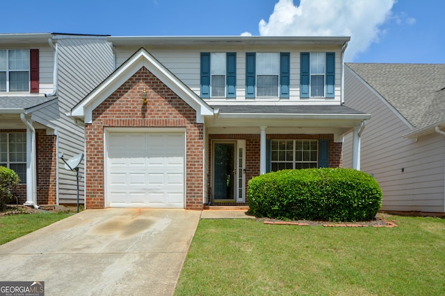 traditional home with brick siding, driveway, a front lawn, and a garage