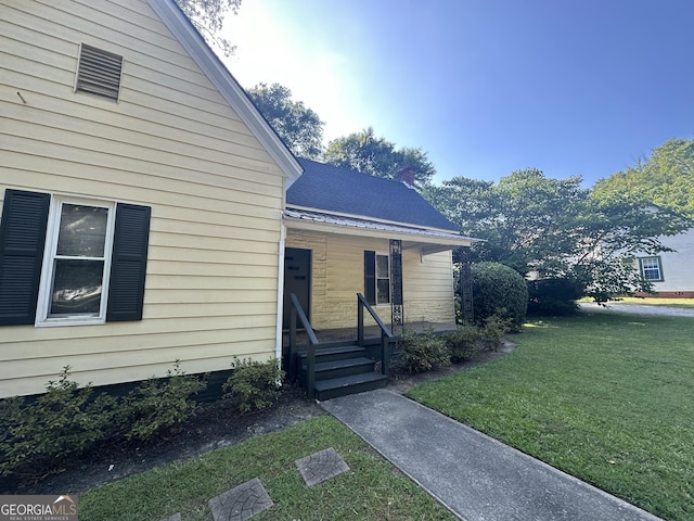 808 S Broad St, Monroe, GA 30655 - exterior space featuring a porch and a front yard
