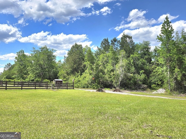 view of yard with fence