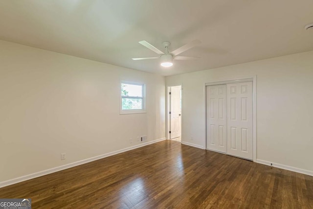 3275 Clifton Church Rd SE, Atlanta, GA 30316 - unfurnished bedroom featuring baseboards, a closet, visible vents, and wood finished floors