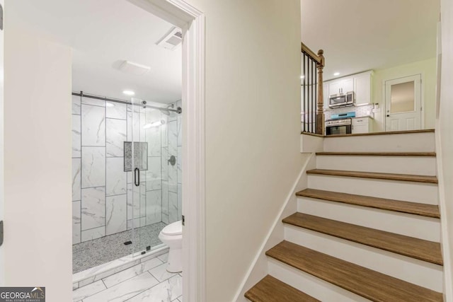 3275 Clifton Church Rd SE, Atlanta, GA 30316 - stairs with marble finish floor, visible vents, and recessed lighting