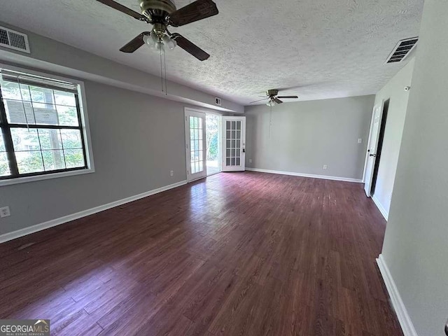 4464 Cary Dr, Snellville, GA 30039 - unfurnished room featuring baseboards, visible vents, dark wood finished floors, and ceiling fan