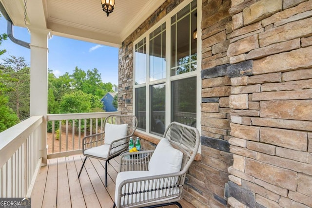 wooden deck featuring a porch