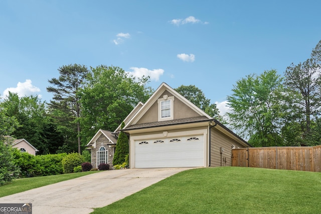 1020 Regency Dr, Acworth, GA 30102 - traditional-style house with a garage, stucco siding, and concrete driveway