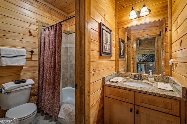 bathroom featuring wood walls, toilet, vanity, and shower / tub combo with curtain