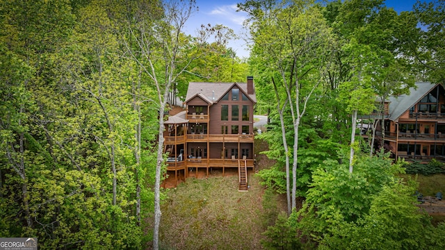 150 Katahdin Dr, Mineral Bluff, GA 30559 - rear view of house featuring a balcony, a chimney, stairs, and a wooden deck