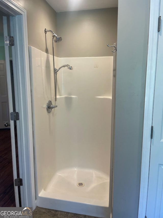 bathroom with a stall shower