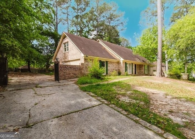 view of front of house with brick siding