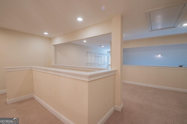 interior space with carpet floors, recessed lighting, and baseboards